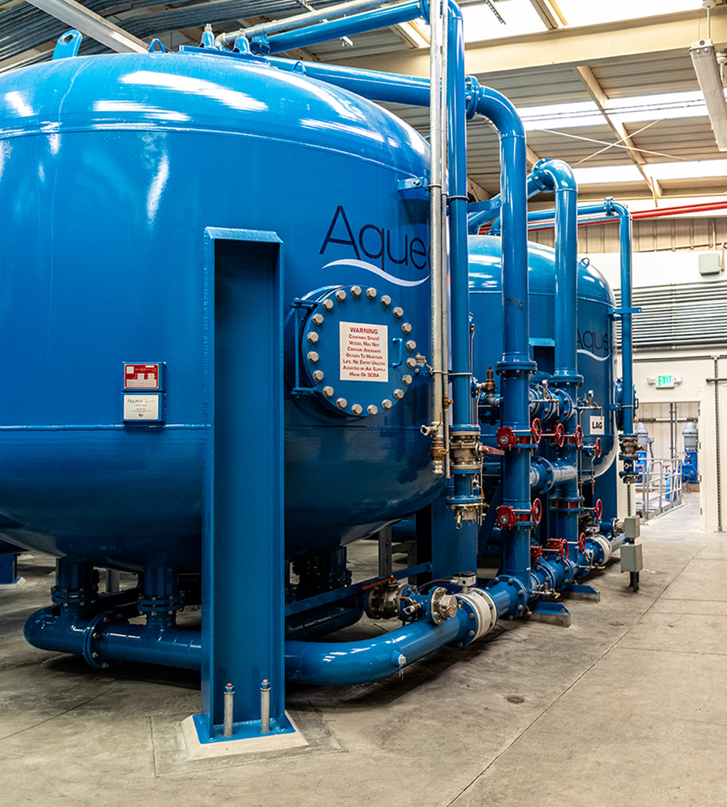 Man taking a water sample 